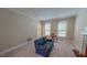 Comfortable living room with cozy seating, lots of natural light, and a fireplace perfect for a relaxing atmosphere at 20 Banbury Ct, Roxboro, NC 27573