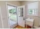 Functional mud room with door to back yard and utility sink at 20 Banbury Ct, Roxboro, NC 27573