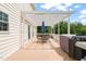 Outdoor deck with white pergola, patio furniture, grill, and a view of the backyard at 2000 Katesbridge Ln, Raleigh, NC 27614