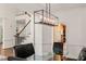 Dining room with modern chandelier and a view into staircase at 2000 Katesbridge Ln, Raleigh, NC 27614