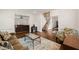 Inviting living room featuring hardwood floors, stylish decor, and an open layout leading to other areas at 2000 Katesbridge Ln, Raleigh, NC 27614