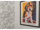 Close-up of dog-themed wallpaper paired with a framed dog art print, adding character to the home at 2000 Katesbridge Ln, Raleigh, NC 27614