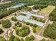 Aerial view of the school with athletic fields and parking lots at 205 Benwell Ct, Cary, NC 27519