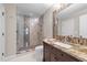 Bathroom featuring a glass shower, granite countertop and vanity at 205 Benwell Ct, Cary, NC 27519