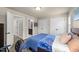 This bedroom has two large closets, natural light, and neutral colors at 205 Benwell Ct, Cary, NC 27519