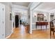 Elegant foyer with hardwood floors, decorative molding, and an open view into the living spaces at 205 Benwell Ct, Cary, NC 27519