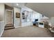 This living room is equipped with a desk space, games, and built in shelves and cabinets at 205 Benwell Ct, Cary, NC 27519