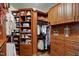Custom walk-in closet with shelves, drawers, and hanging rods at 205 Benwell Ct, Cary, NC 27519