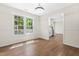 Bright dining area with a view of the backyard and seamless flow into the kitchen, perfect for enjoying meals at home at 214 Wax Myrtle Ct, Cary, NC 27513