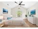 Serene main bedroom with vaulted ceilings, natural light, and calming decor, creating a peaceful retreat at 214 Wax Myrtle Ct, Cary, NC 27513