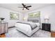 Serene bedroom features soft lighting, a neutral color scheme, and a plush rug for added warmth at 2205 W Carver St, Durham, NC 27705