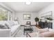 Inviting living room with ample seating, hardwood floors, and natural light at 2205 W Carver St, Durham, NC 27705