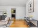Bright, open-concept living room with hardwood floors and stylish decor at 2205 W Carver St, Durham, NC 27705