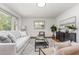 Cozy living room with ample seating, hardwood floors, and modern decor at 2205 W Carver St, Durham, NC 27705