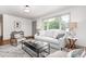 Comfortable living room with natural light and contemporary furnishings at 2205 W Carver St, Durham, NC 27705