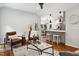 Open concept living room flows into the kitchen with modern finishes and natural light at 2409 New Hope Church Rd, Chapel Hill, NC 27514