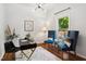 Bright office features hardwood floors, stylish furnishings, and a large window at 2409 New Hope Church Rd, Chapel Hill, NC 27514