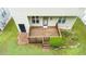 Aerial view of back deck with mature landscaping and patio area ready for relaxation and entertaining at 2420 Sapphire Valley Dr, Raleigh, NC 27604