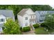 Two-story home boasts a well-maintained lawn and classic architecture at 2420 Sapphire Valley Dr, Raleigh, NC 27604
