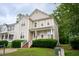Close-up of home entrance; featuring a decorative wreath, porch and brick stairs at 2420 Sapphire Valley Dr, Raleigh, NC 27604