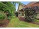 Lush backyard with manicured lawn and mature landscaping at 2507 Mayview Rd, Raleigh, NC 27607