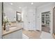 Bathroom with marble countertops, tiled floors, and ample counter space at 2507 Mayview Rd, Raleigh, NC 27607