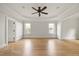 Spacious bedroom features tray ceiling, ceiling fan, and plenty of natural light at 2507 Mayview Rd, Raleigh, NC 27607