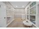 Walk-in closet with built-in shelving and lots of natural light at 2507 Mayview Rd, Raleigh, NC 27607