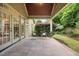 Charming outdoor patio with stone flooring and views of the yard at 2507 Mayview Rd, Raleigh, NC 27607