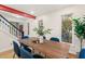 Bright dining room featuring a modern table, stylish chairs, and natural lighting at 2525 Buxton Ct, Chapel Hill, NC 27514