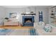 Inviting living room with a decorative fireplace, comfortable seating, and stylish decor at 2525 Buxton Ct, Chapel Hill, NC 27514