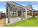 Backyard view featuring a pergola, covered patio with lights, pavers, and a lawn at 2622 Perthshire Ln, Fuquay Varina, NC 27526
