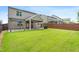 Spacious backyard featuring a pergola, covered patio, privacy fence and an expansive lawn at 2622 Perthshire Ln, Fuquay Varina, NC 27526
