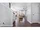 Inviting foyer featuring hardwood floors and a view of the open-concept living area at 2622 Perthshire Ln, Fuquay Varina, NC 27526