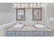 Bathroom featuring a double sink vanity with granite counters at 2721 Dahlgreen Rd, Raleigh, NC 27615