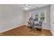 Bedroom features hardwood flooring and a ceiling fan at 2721 Dahlgreen Rd, Raleigh, NC 27615