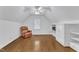 Bonus room featuring hardwood flooring and a built-in entertainment center at 2721 Dahlgreen Rd, Raleigh, NC 27615