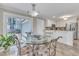 Bright breakfast nook has tile flooring and is open to the kitchen at 2721 Dahlgreen Rd, Raleigh, NC 27615