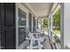 Relaxing front porch with comfortable seating, perfect for enjoying the outdoors at 2721 Dahlgreen Rd, Raleigh, NC 27615
