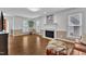 Comfortable living room with a fireplace, hardwood floors, and a relaxing atmosphere at 2721 Dahlgreen Rd, Raleigh, NC 27615
