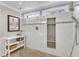 Beautiful tiled shower featuring a built-in toiletry shelf, and a mosaic tile floor at 2721 Dahlgreen Rd, Raleigh, NC 27615