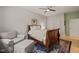 This bedroom offers a bed, chair, and unique rug that enhances the room's appeal at 2721 Silver Stirrup Ln, Apex, NC 27502