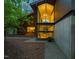 Striking home exterior with a wall of glass and modern architectural details at 2721 Silver Stirrup Ln, Apex, NC 27502