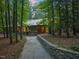 Scenic home with stone pathway and mature landscaping at 2721 Silver Stirrup Ln, Apex, NC 27502