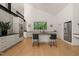 Bright kitchen with an island, stainless steel appliances, sleek cabinetry, and lots of natural light at 2721 Silver Stirrup Ln, Apex, NC 27502