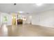 Open bonus room with bar counter and ample space for entertaining and relaxing at 3123 Amherst Ave, Burlington, NC 27215