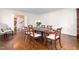 Dining room showcasing hardwood floors, traditional furniture and access to foyer at 3123 Amherst Ave, Burlington, NC 27215