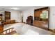 Bright living room features large windows, carpet, and hardwood floors at 3123 Amherst Ave, Burlington, NC 27215