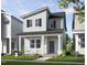 Charming two-story home featuring a welcoming front porch and beautifully landscaped yard at 336 Cottage Hill Way, Raleigh, NC 27604
