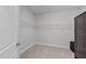 Bright walk-in closet with wire shelving and neutral carpet flooring, offering ample storage space at 348 Golf Vista Trl, Holly Springs, NC 27540